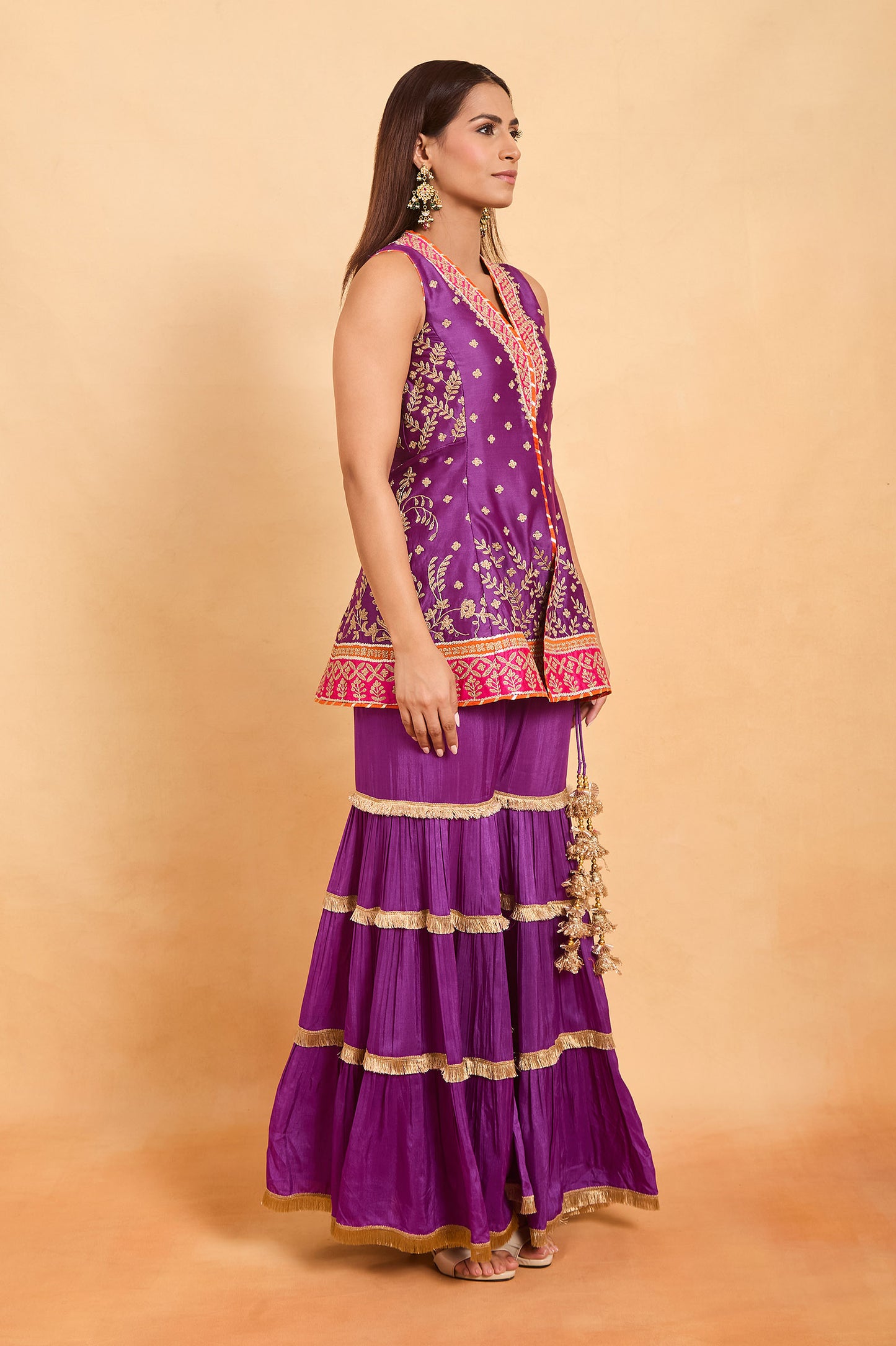Vibrant Purple Sleeveless Peplum Kurti & Tiered Gharara Set