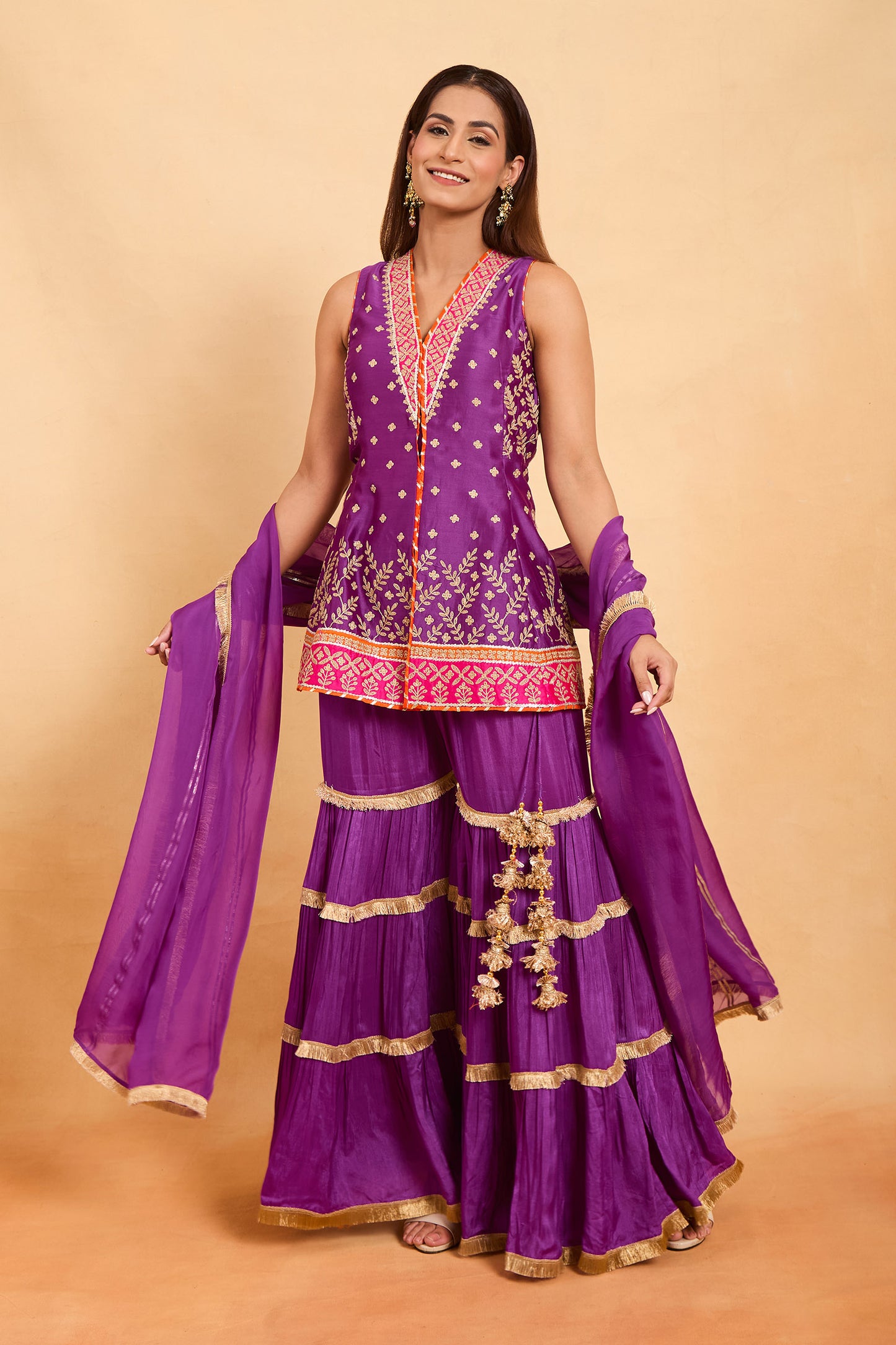 Vibrant Purple Sleeveless Peplum Kurti & Tiered Gharara Set