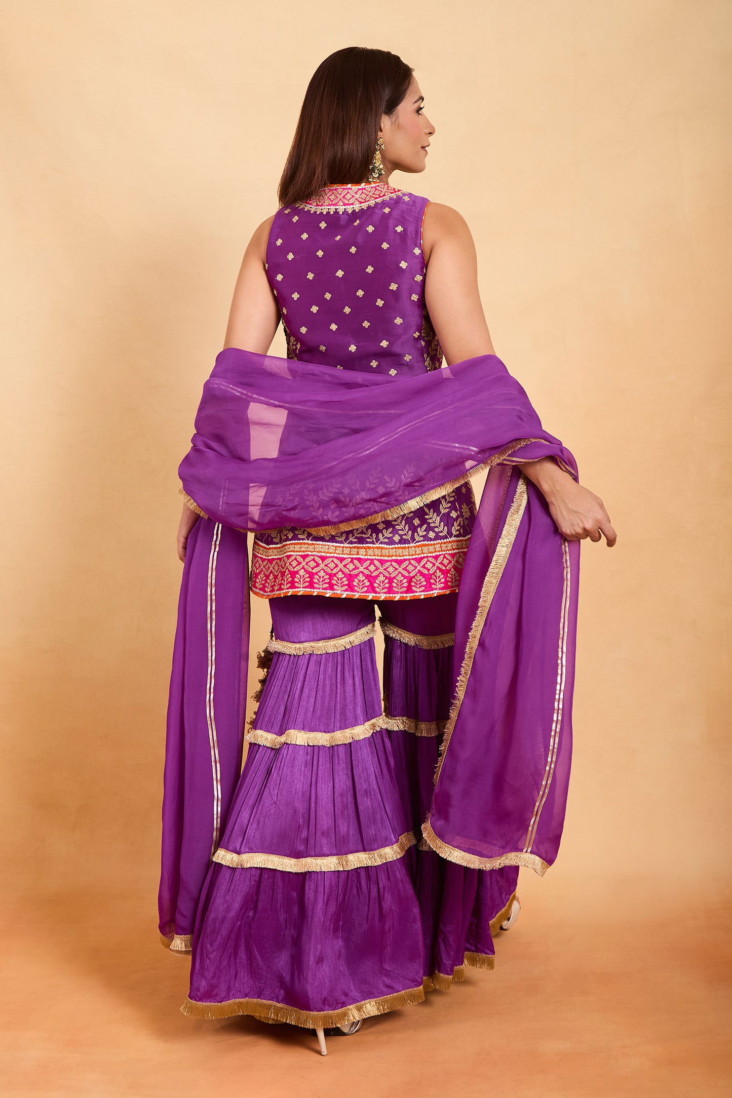 Vibrant Purple Sleeveless Peplum Kurti & Tiered Gharara Set
