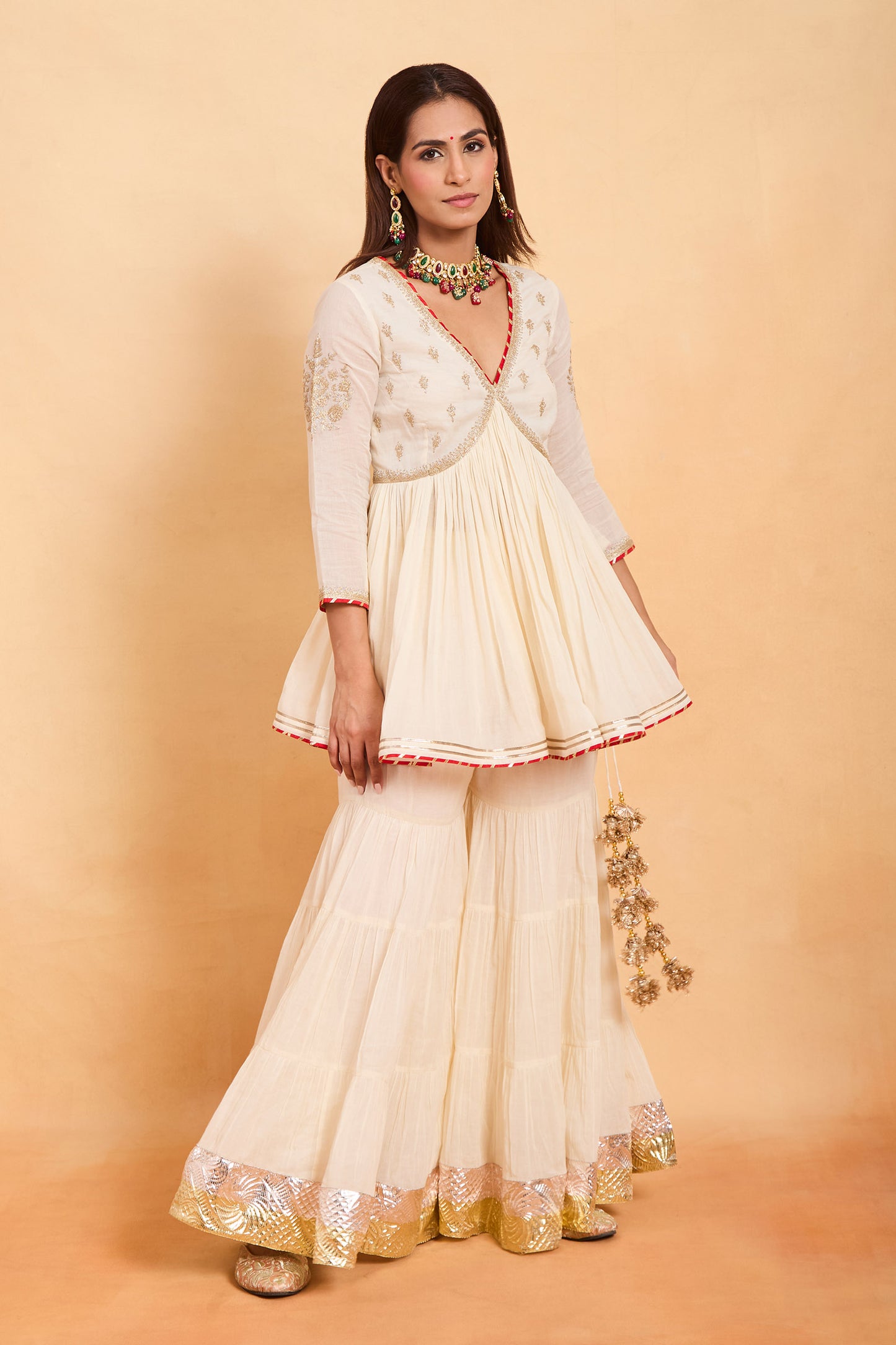 Chic Cream Peplum Kurti & Gharara Set with Vibrant Red Contrast