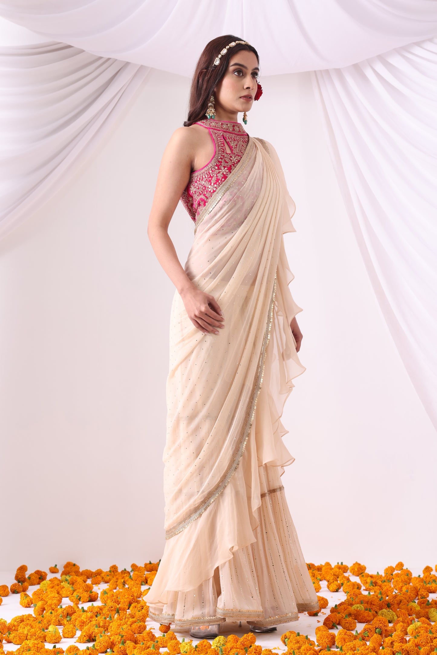 Beige Draped Saree with Magenta Halter Blouse